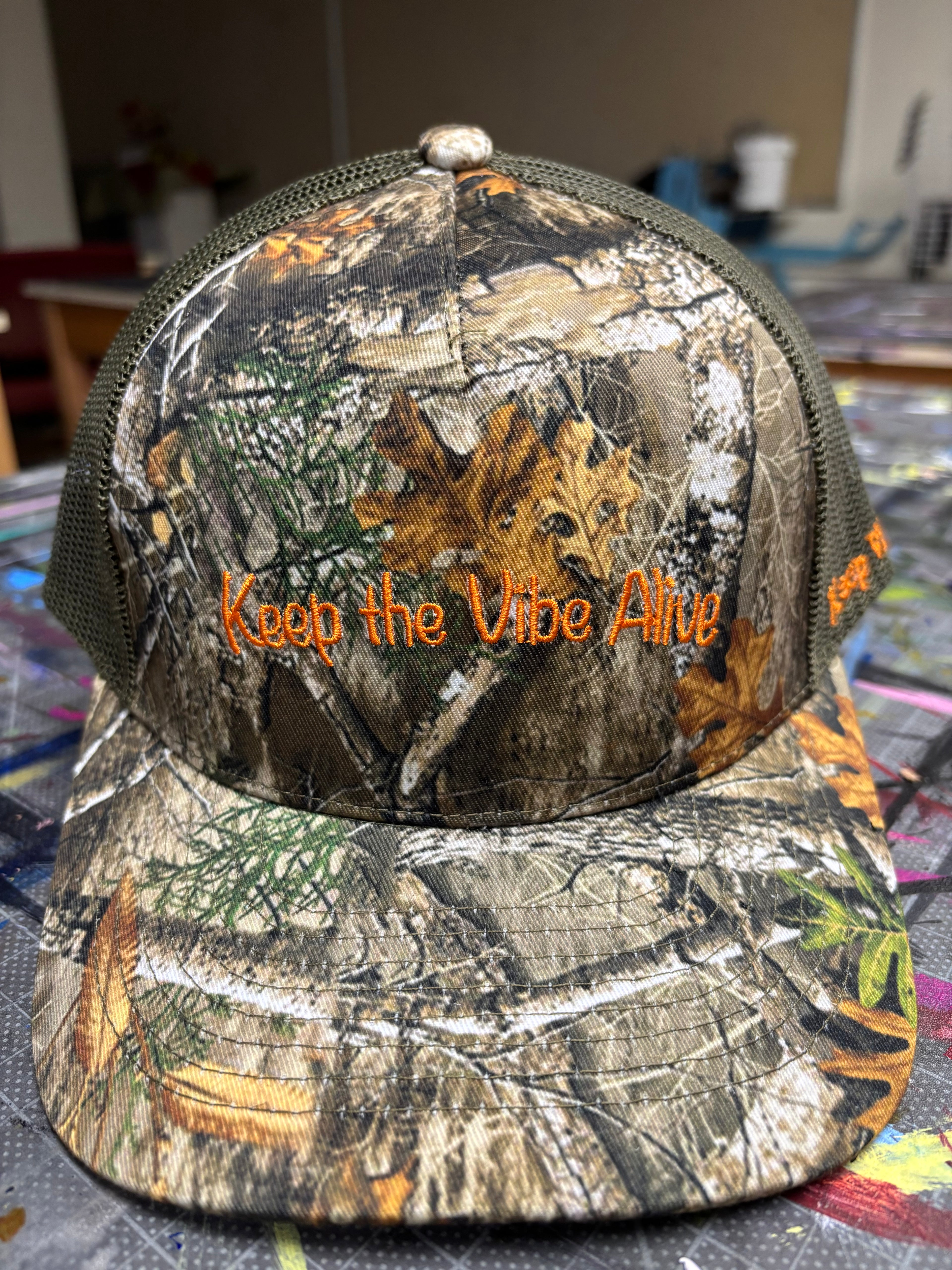“Standing Out” Camo Trucker Hats