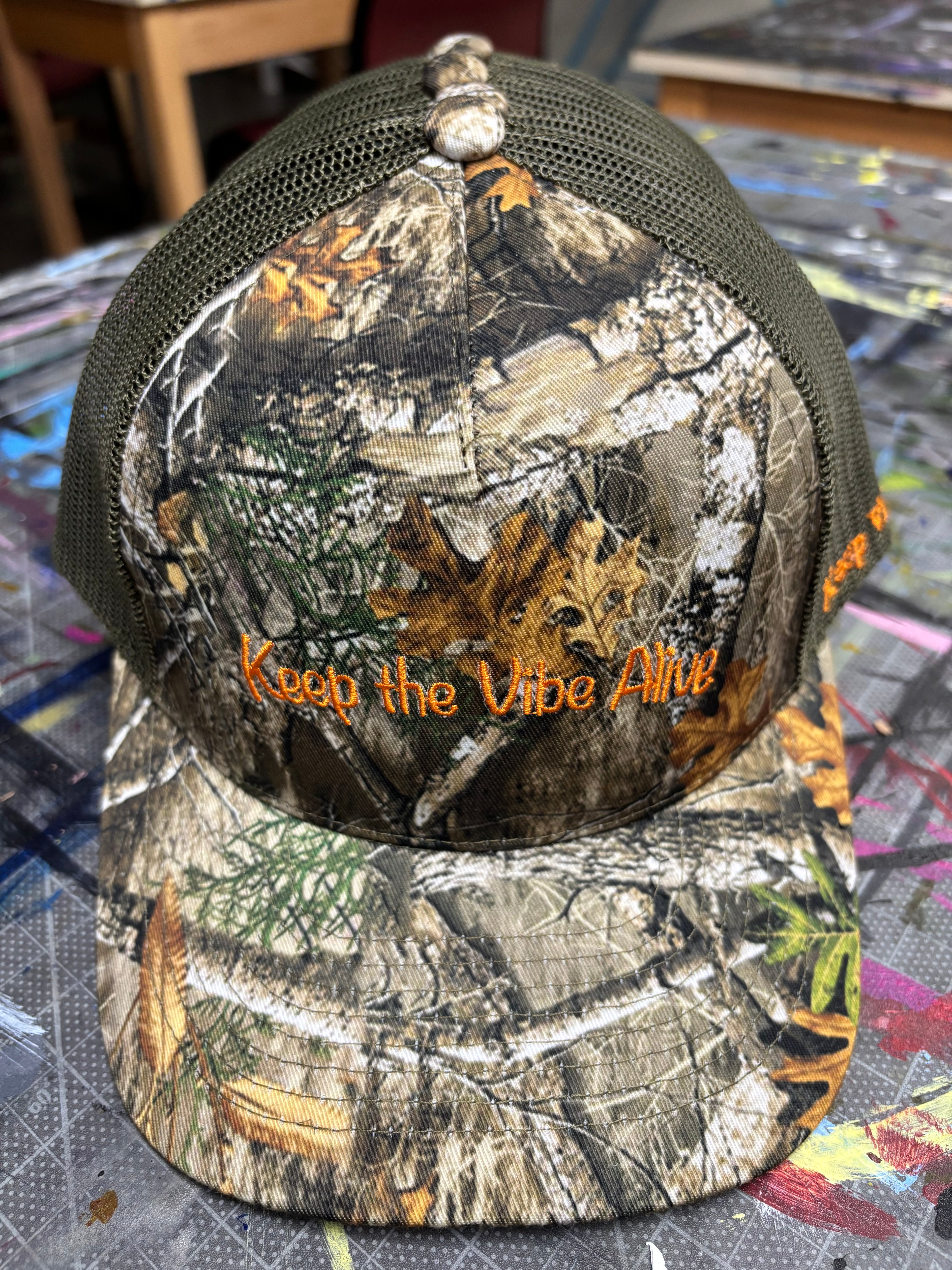 “Standing Out” Camo Trucker Hats